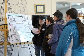 Volunteers lobby checkin clean up day