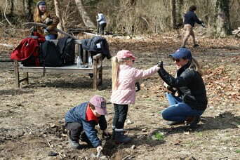 Volunteer family homesite clean up day