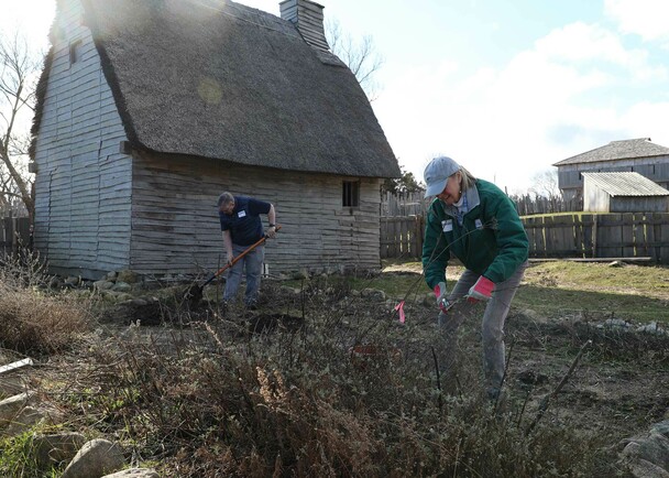 Volunteers garden village clean up day