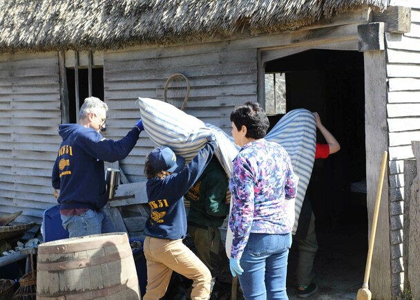 Volunteers village house clean up day