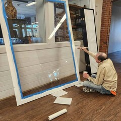 Volunteer trustee painting clean up day