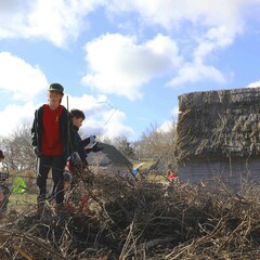 Young volunteers village clean up day