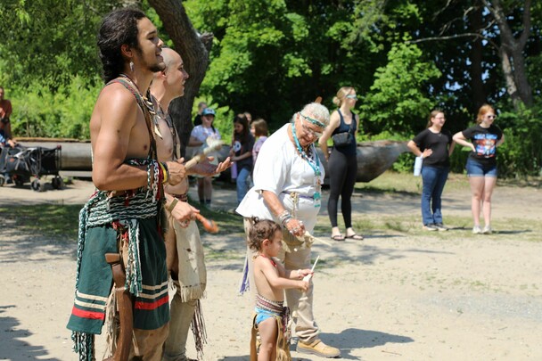 Wampanoag Educators sing to lead traditional dance on the Historic Patuxet Homesite