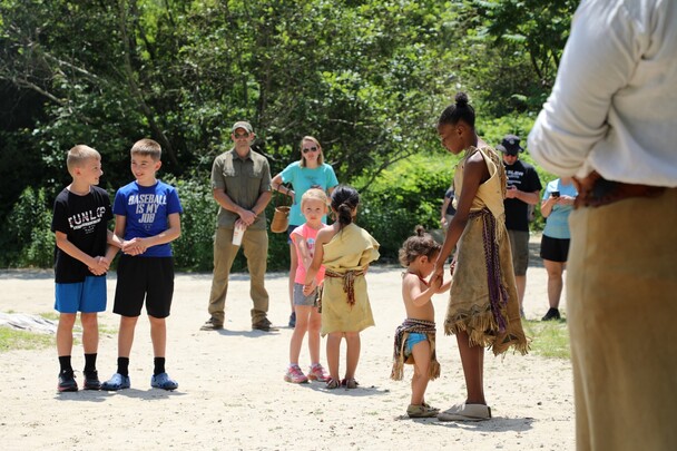 Children participate in Wampanoag dance on the Historic Patuxet Homesite